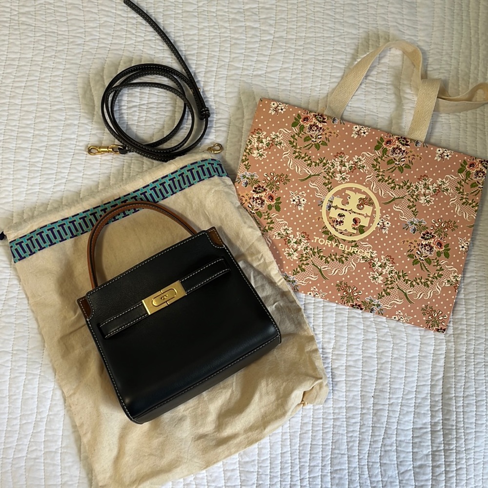 Used, like new with tag and Tory Burch bag.